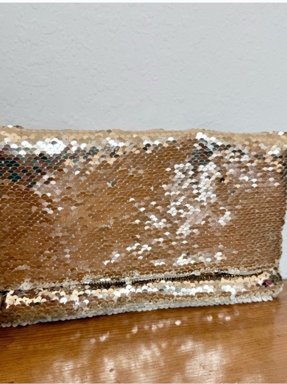 Stella & Dot Reversible Sequin Clutch in Gold and Silver.